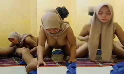 Bokep tante jilbab cokelat ngentot dikosan